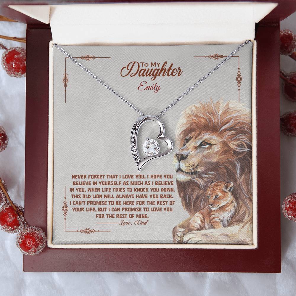 a gift box with a stainless steel heart shapped pedant necklace with a large cz diamond and small ca chip diamonds on the perimeter A