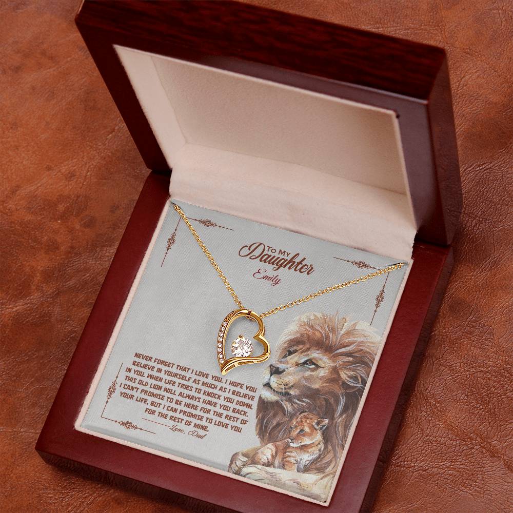 a gift box with a stainless steel heart shapped pedant necklace with a large cz diamond and small ca chip diamonds on the perimeter A