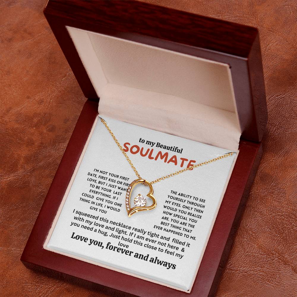 Necklace on a gift card, showcasing a 6.5mm round cut cubic zirconia stone in 18k yellow gold finish, with pendant dimensions of 0.8 inches in height and 0.7 inches in width, adjustable chain length from 18 to 22 inches, and a lobster clasp.