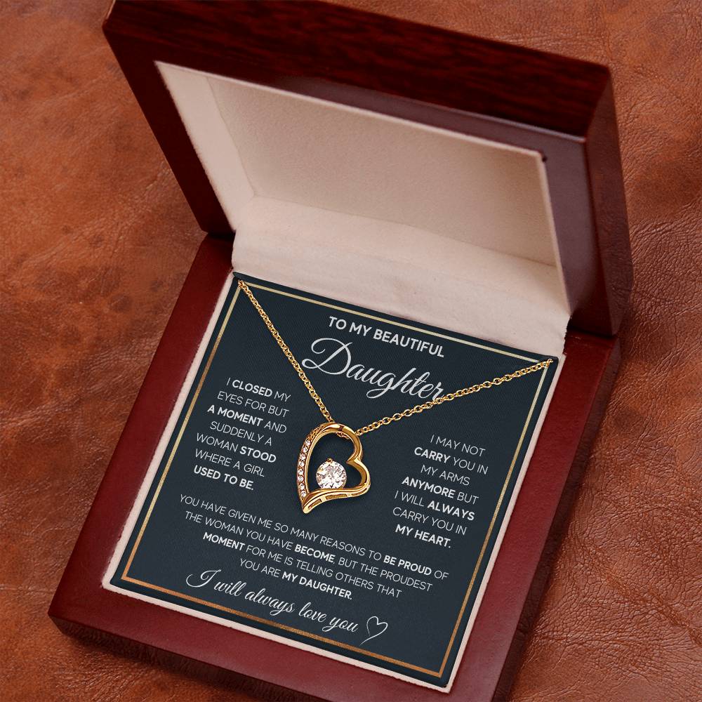 The dazzling Forever Love Necklace is sure to make her heart melt! This necklace features a stunning 6.5mm CZ crystal surrounded by a polished heart pendant embellished with smaller crystals to add extra sparkle and shine. Beautifully crafted with either a white gold or yellow gold finish, be sure to give her a classic gift she can enjoy everyday.