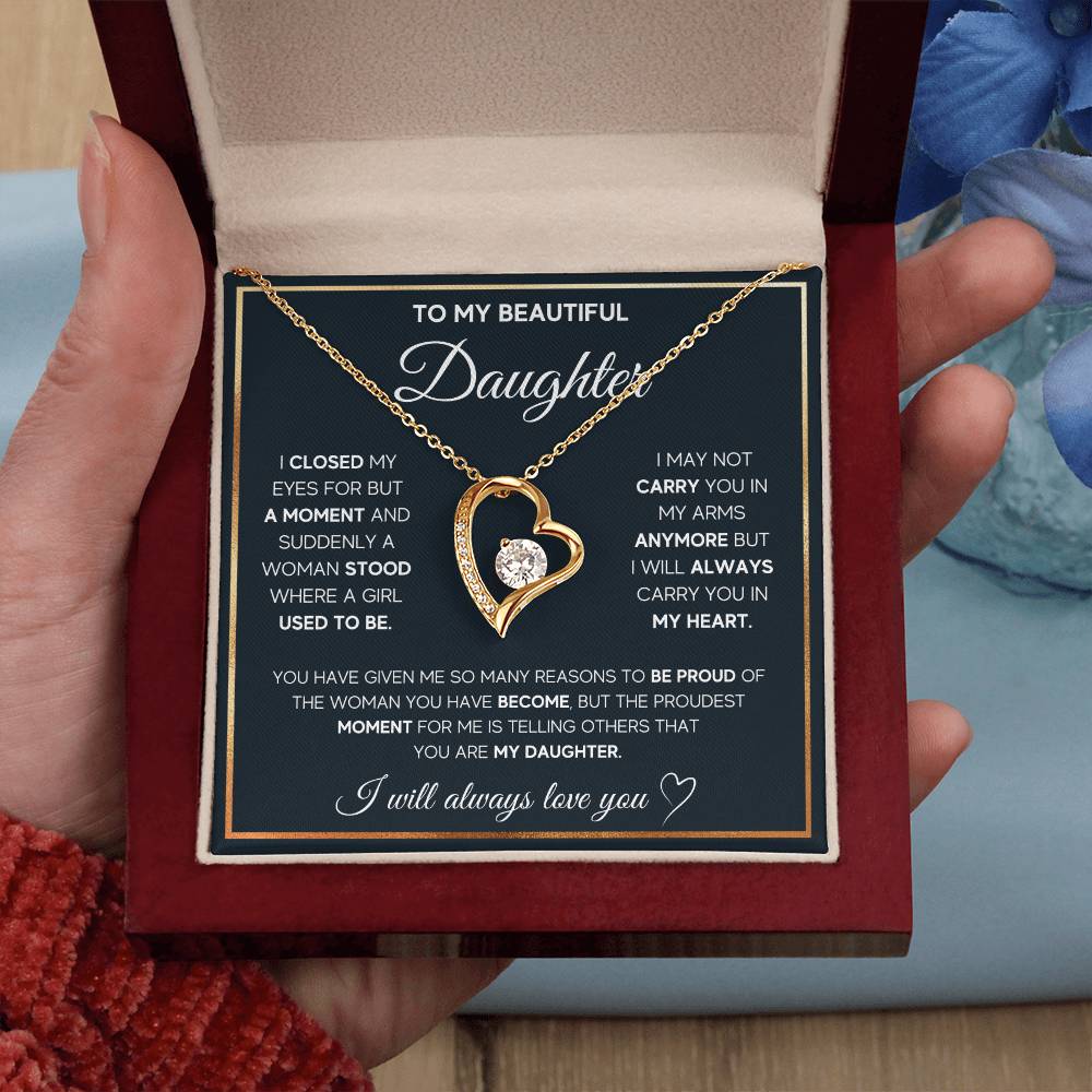 The dazzling Forever Love Necklace is sure to make her heart melt! This necklace features a stunning 6.5mm CZ crystal surrounded by a polished heart pendant embellished with smaller crystals to add extra sparkle and shine. Beautifully crafted with either a white gold or yellow gold finish, be sure to give her a classic gift she can enjoy everyday.
