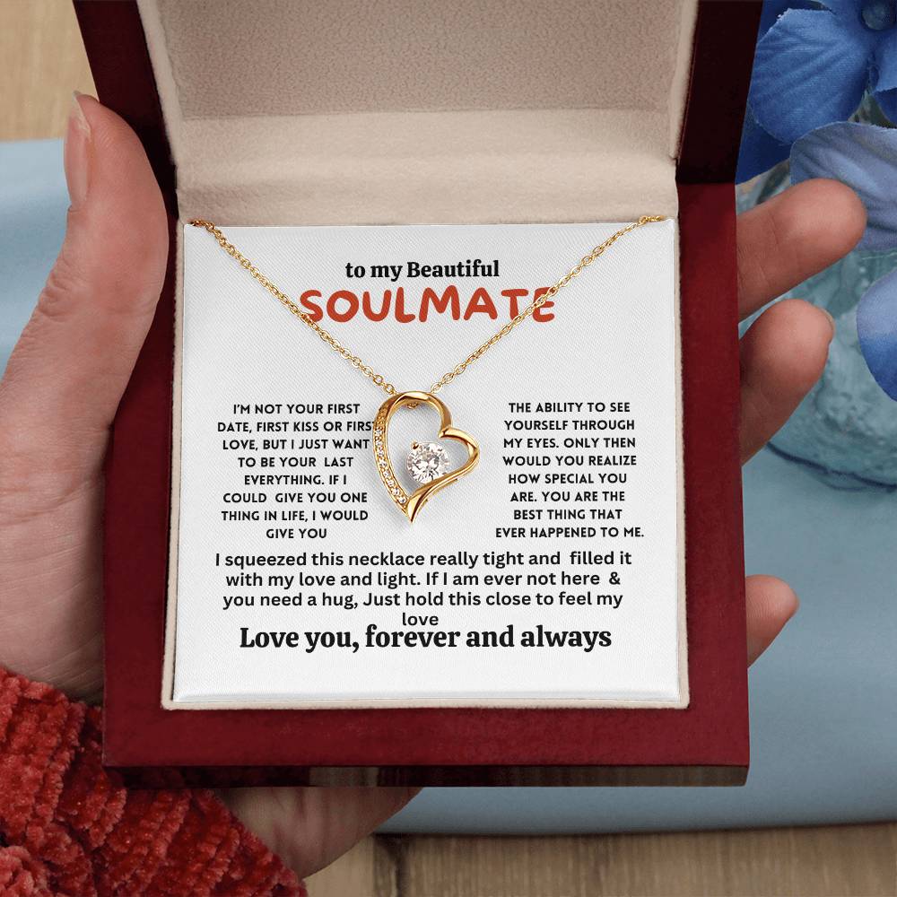 Necklace on a gift card, showcasing a 6.5mm round cut cubic zirconia stone in 18k yellow gold finish, with pendant dimensions of 0.8 inches in height and 0.7 inches in width, adjustable chain length from 18 to 22 inches, and a lobster clasp.