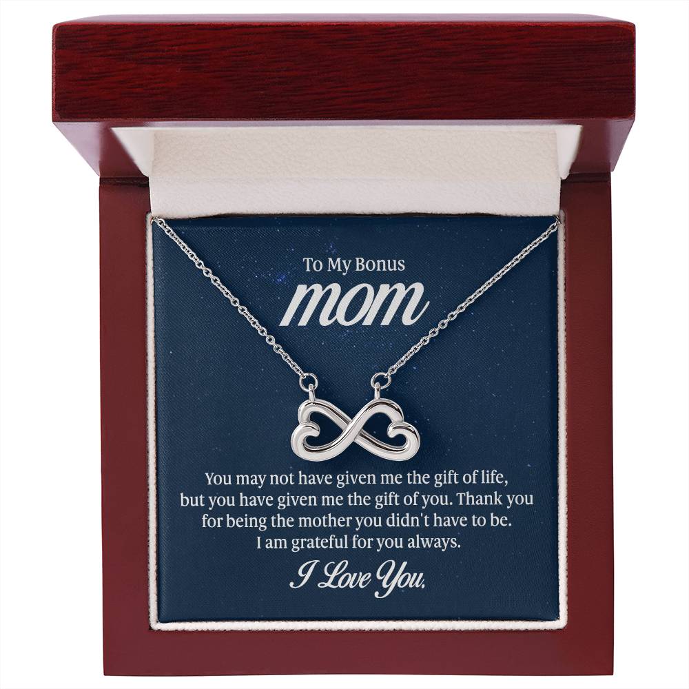 Gift card with the Endless Love Necklace, featuring a heart-shaped infinity symbol crafted in 14k white gold finish, hand-polished for a magnificent shine