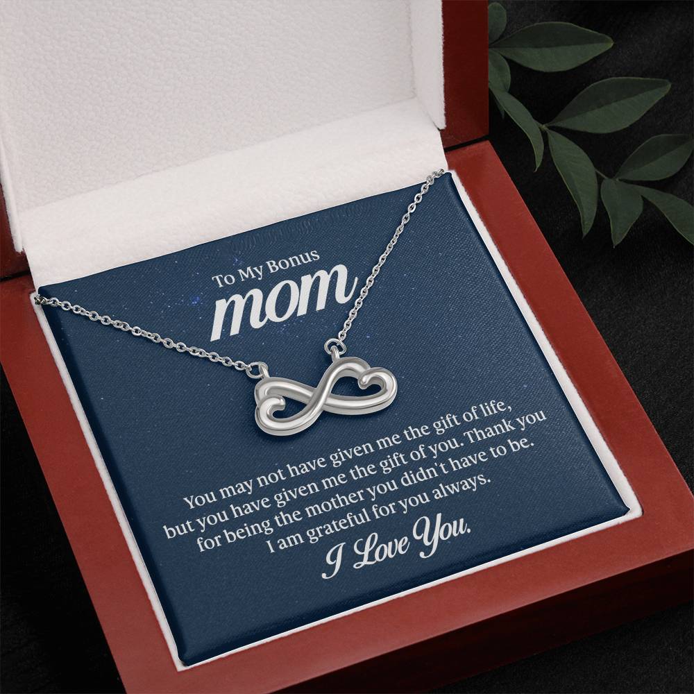 Gift card with the Endless Love Necklace, featuring a heart-shaped infinity symbol crafted in 14k white gold finish, hand-polished for a magnificent shine