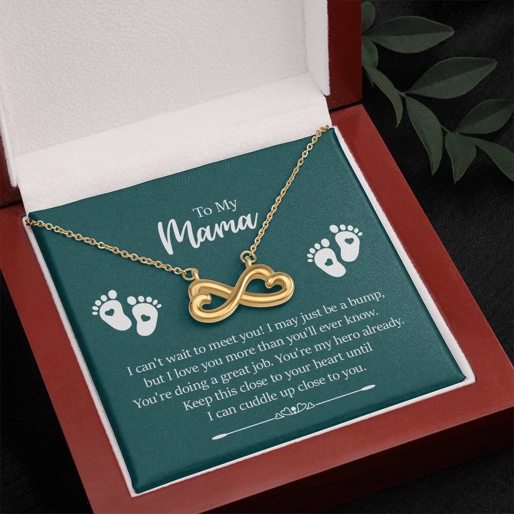 Endless Love Necklace on a gift card, showcasing a heart-shaped infinity symbol in 18k yellow gold finish, artisan-crafted and hand-polished, dimensions 0.5 inches in height and 1 inch in width, hanging elegantly on a 16 to 22-inch adjustable cable chain with a lobster clasp, and inscribed with 'I'll love you till the end of time.