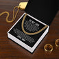 Men's necklace on a gift card, crafted from polished stainless steel and 14k yellow gold over stainless steel, featuring a chain width of 5 mm, adjustable length of 18 to 22 inches, weighing 28.5 grams, with a parrot clasp.