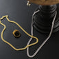 Men's necklaces, crafted from polished stainless steel, featuring a chain width of 5 mm, adjustable length of 18 to 22 inches, weighing 28.5 grams, with a parrot clasp.