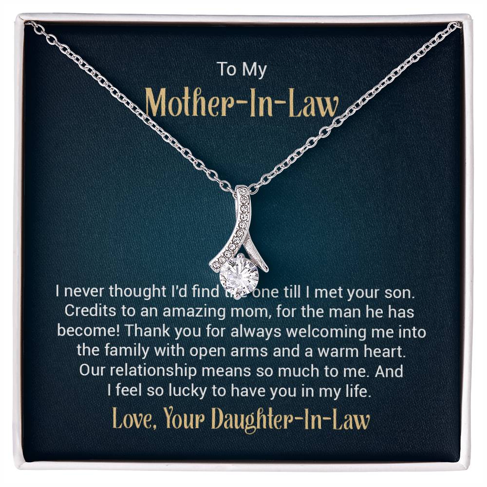 Gift card with a necklace featuring a 7mm cubic zirconia pendant in 14k white gold finish over stainless steel, pendant dimensions 0.8 inches in height and 0.4 inches in width, adjustable chain length of 18 to 22 inches, with a lobster clasp.