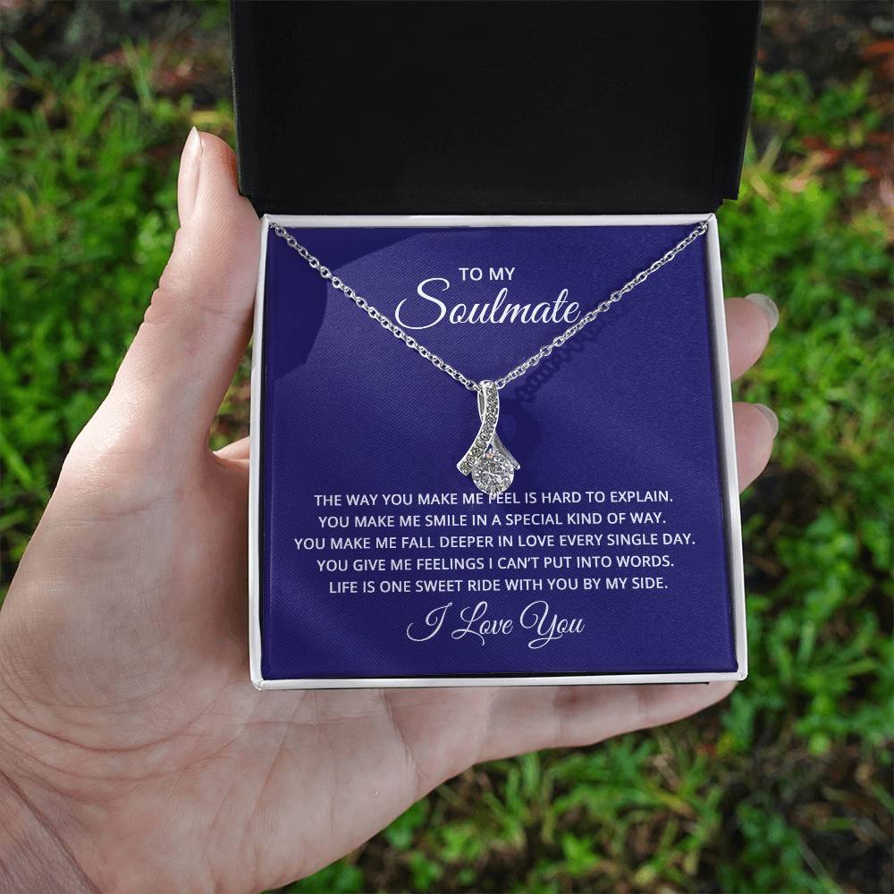 Gift card with a 14k white gold finish over stainless steel necklace, featuring a 7mm cubic zirconia pendant, dimensions 0.8 inches in height and 0.4 inches in width, with an adjustable chain length of 18 to 22 inches.