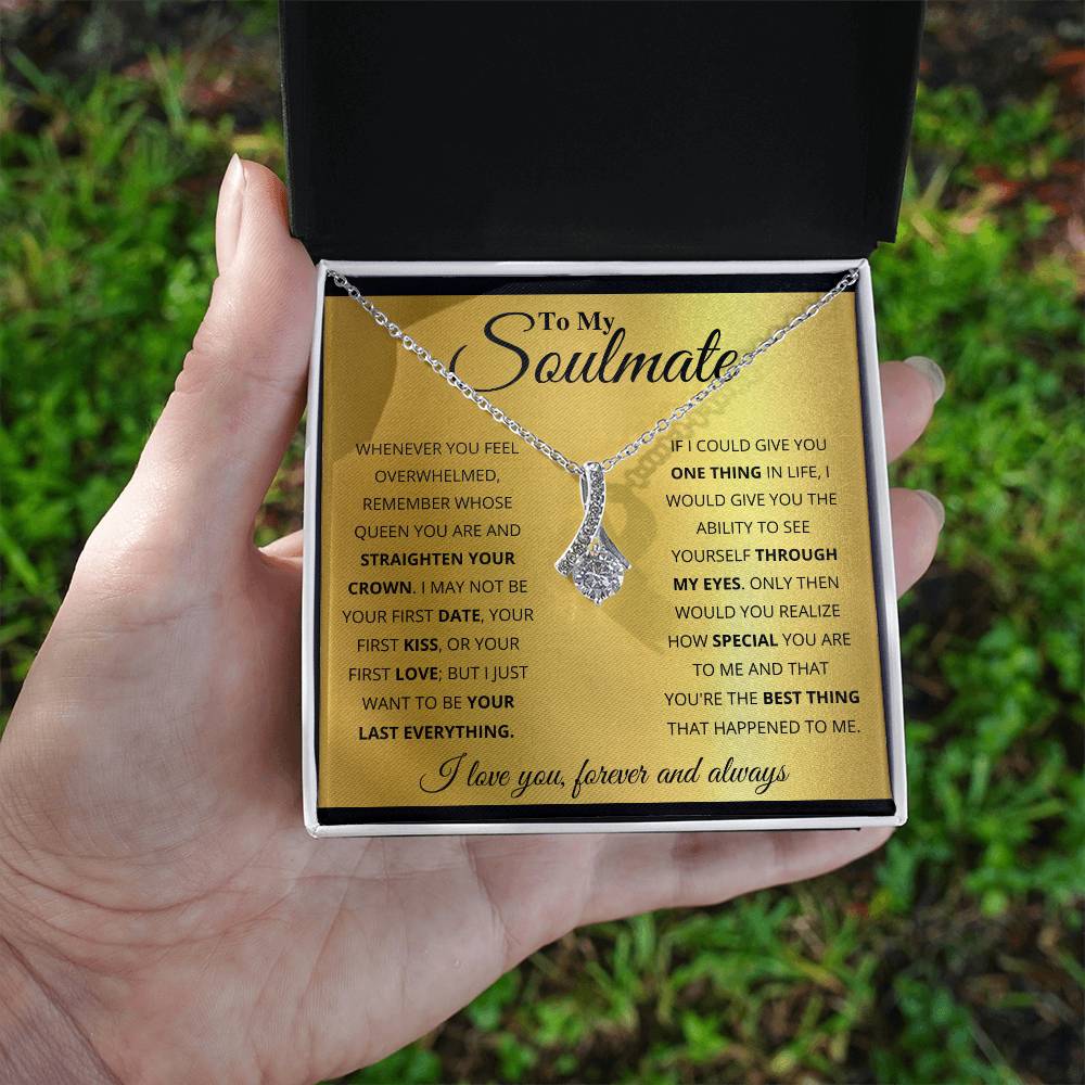 Gift box with The Alluring Beauty pendant necklace features a petite ribbon shaped pendant that is sure to dazzle