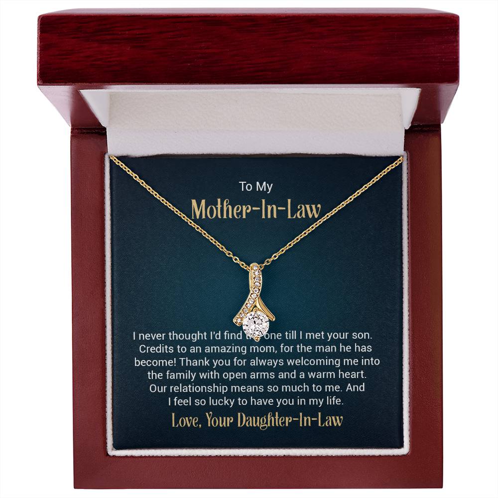 Necklace on a gift card, showcasing a 7mm cubic zirconia pendant in 18k yellow gold finish over stainless steel, with pendant dimensions of 0.8 inches in height and 0.4 inches in width, adjustable chain length from 18 to 22 inches, and a lobster clasp.
