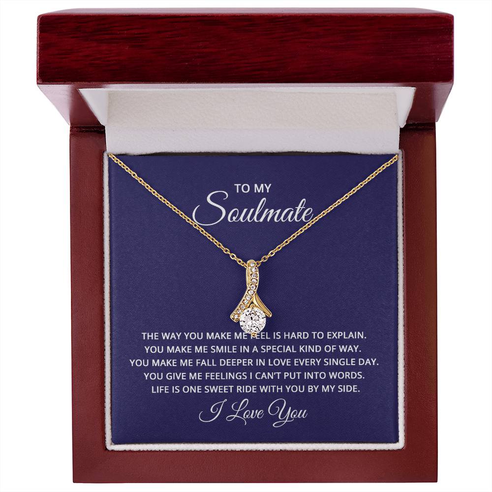 18k yellow gold finish over stainless steel necklace on a gift card, showcasing a 7mm cubic zirconia pendant, measuring 0.8 inches in height and 0.4 inches in width, with an adjustable chain from 18 to 22 inches.