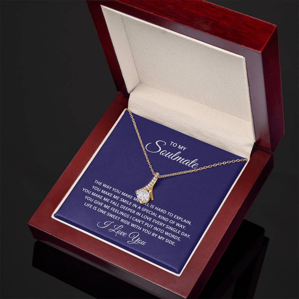 18k yellow gold finish over stainless steel necklace on a gift card, showcasing a 7mm cubic zirconia pendant, measuring 0.8 inches in height and 0.4 inches in width, with an adjustable chain from 18 to 22 inches.