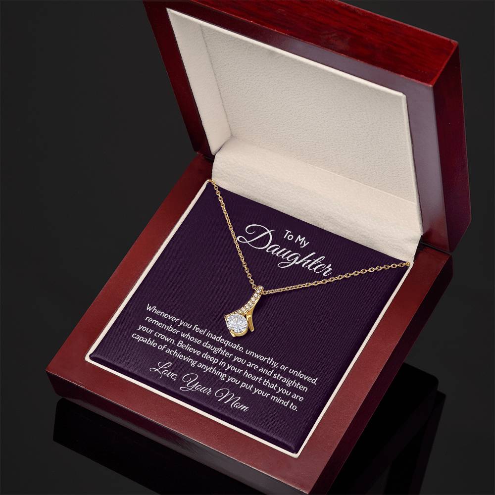 Imagine her reaction when she opens this stunning gift! The Alluring Beauty necklace features a petite ribbon shaped pendant that is sure to dazzle your special someone. Whether it's a birthday or anniversary, make sure to get her a gift she will love for years to come. 