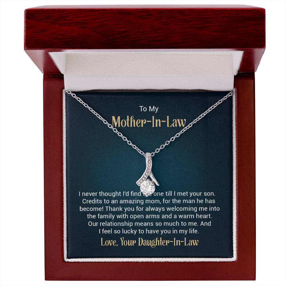 Gift card with a necklace featuring a 7mm cubic zirconia pendant in 14k white gold finish over stainless steel, pendant dimensions 0.8 inches in height and 0.4 inches in width, adjustable chain length of 18 to 22 inches, with a lobster clasp.