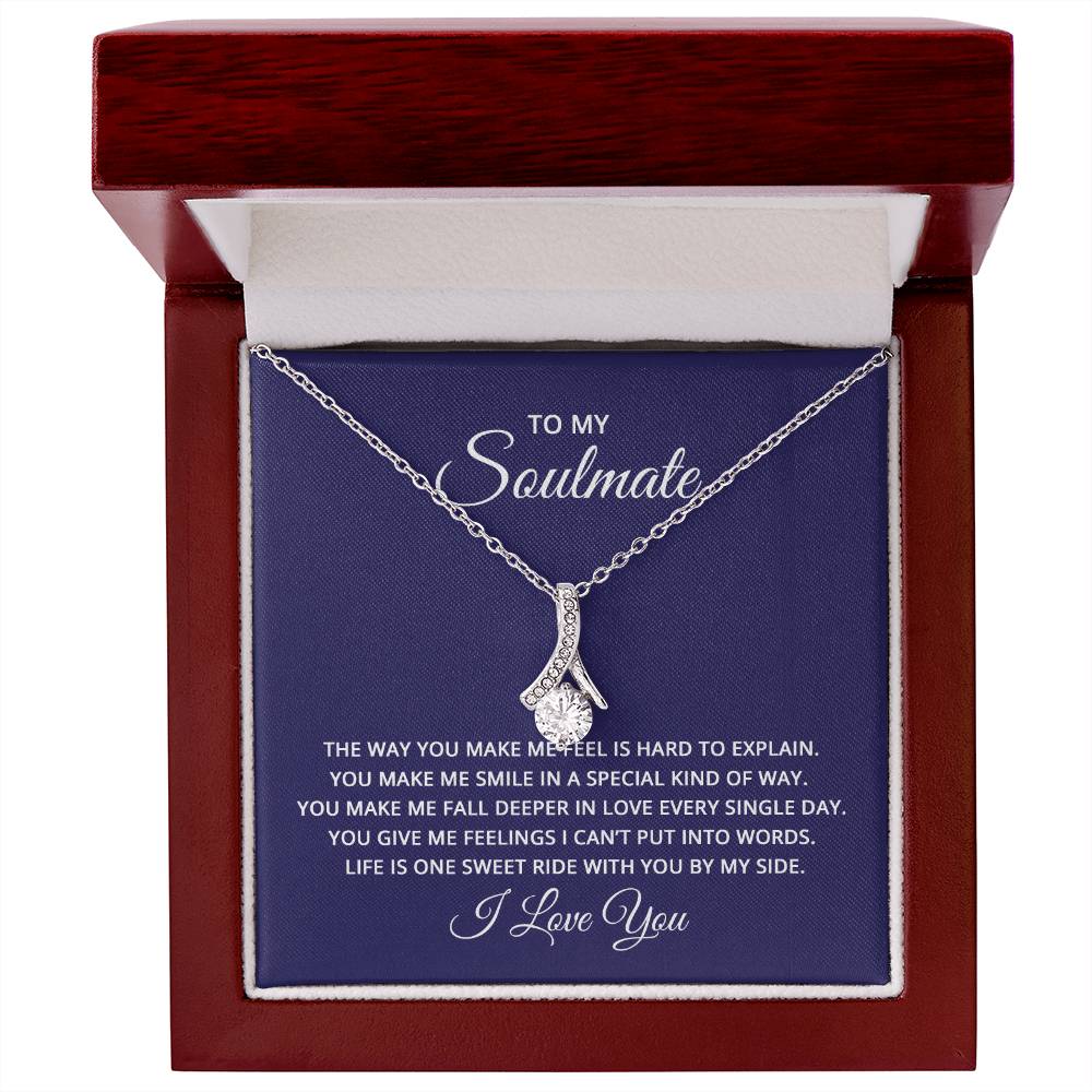 Gift card with a 14k white gold finish over stainless steel necklace, featuring a 7mm cubic zirconia pendant, dimensions 0.8 inches in height and 0.4 inches in width, with an adjustable chain length of 18 to 22 inches.