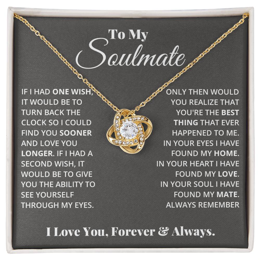 gift card with a Love knot pendant necklace with 2 rings around a large cubit zirconia diamond and 2 interlocking rings with smaller cubit zirconia on them both