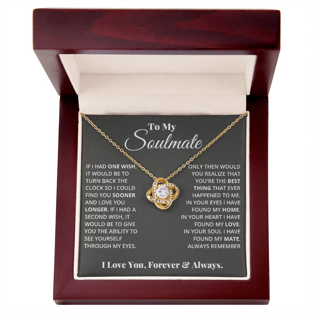 gift card with a Love knot pendant necklace with 2 rings around a large cubit zirconia diamond and 2 interlocking rings with smaller cubit zirconia on them both