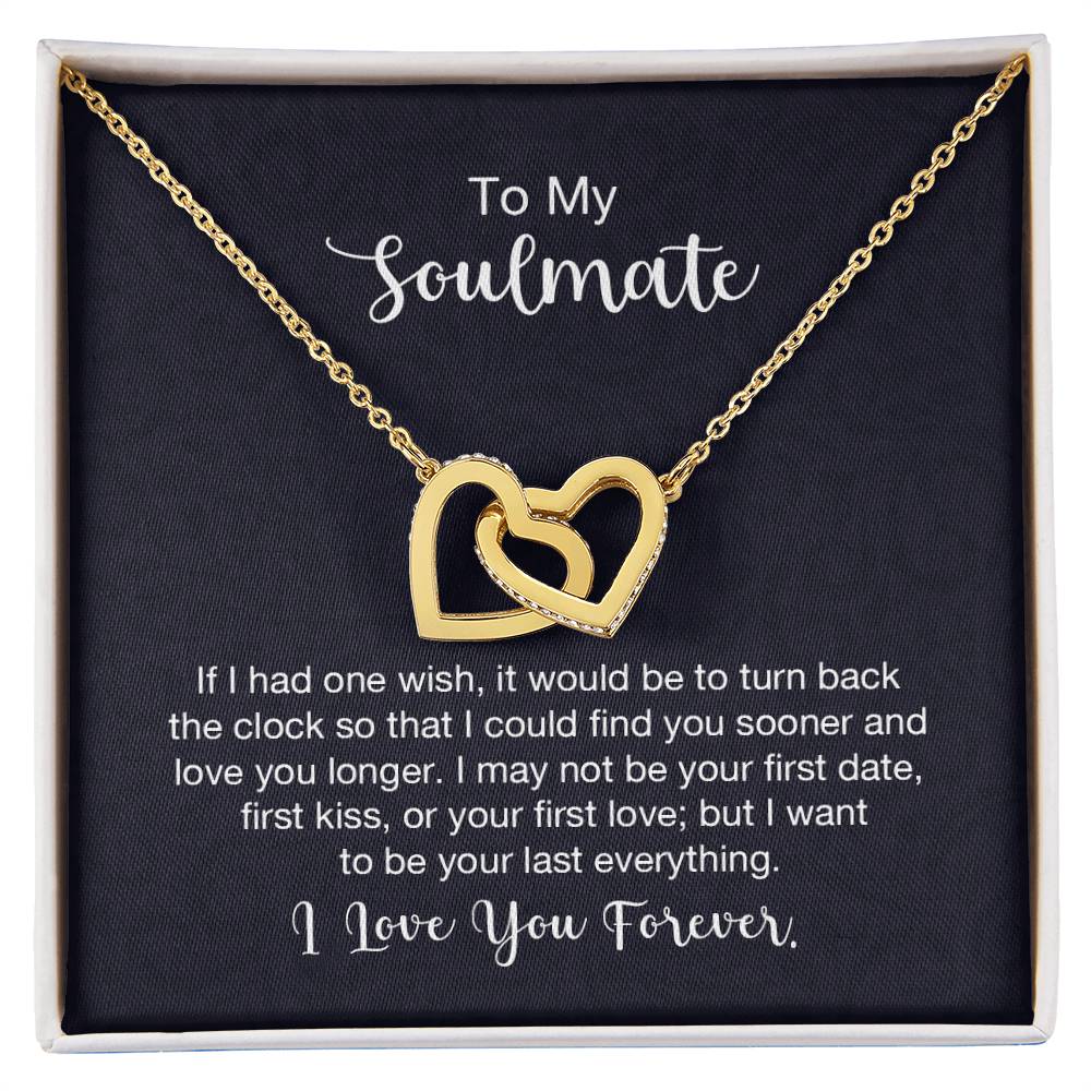 Gift card displaying a necklace with two heart pendants adorned with CZ crystals, featuring an 18k yellow gold finish over high quality polished surgical steel, pendant dimensions 0.6 inches in height and 1.1 inches in width, adjustable chain length from 18 to 22 inches.