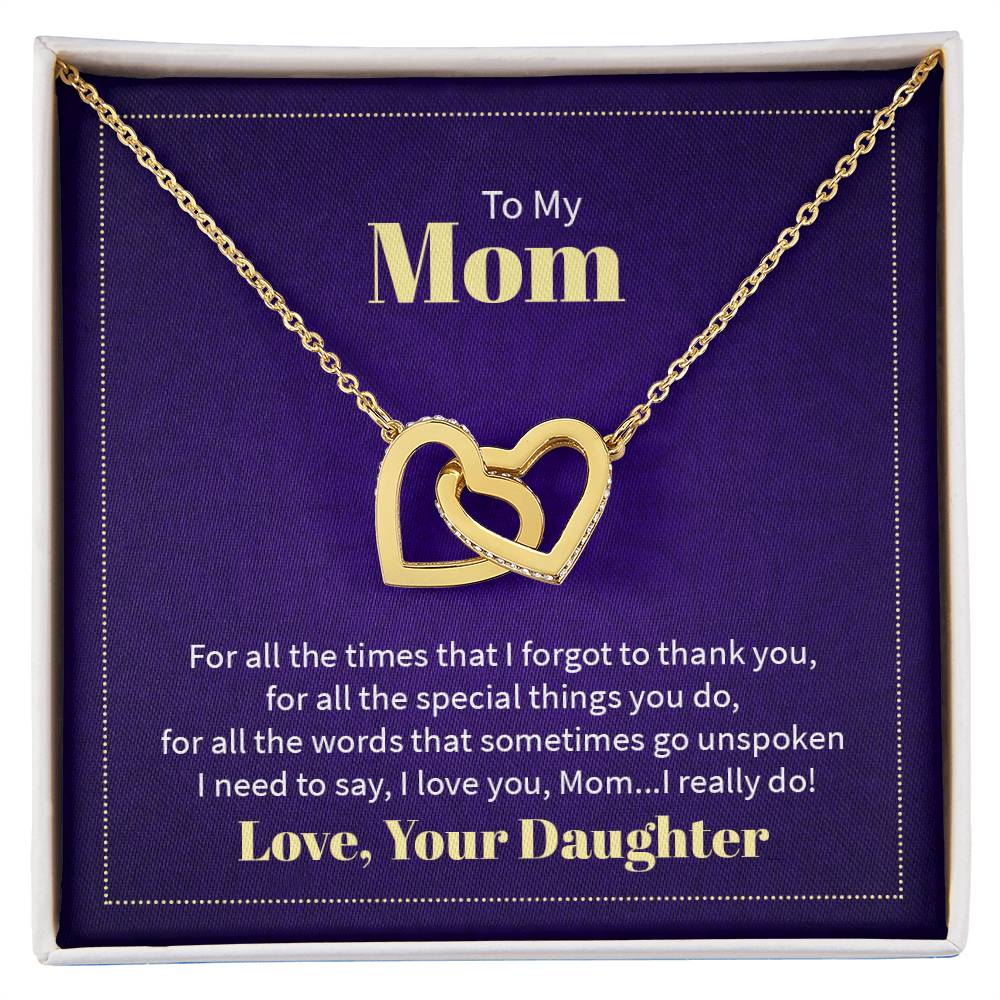 Necklace featuring two heart pendants adorned with CZ crystals, available in polished surgical steel with a rose gold or 18k yellow gold finish, adjustable from 18 to 22 inches.