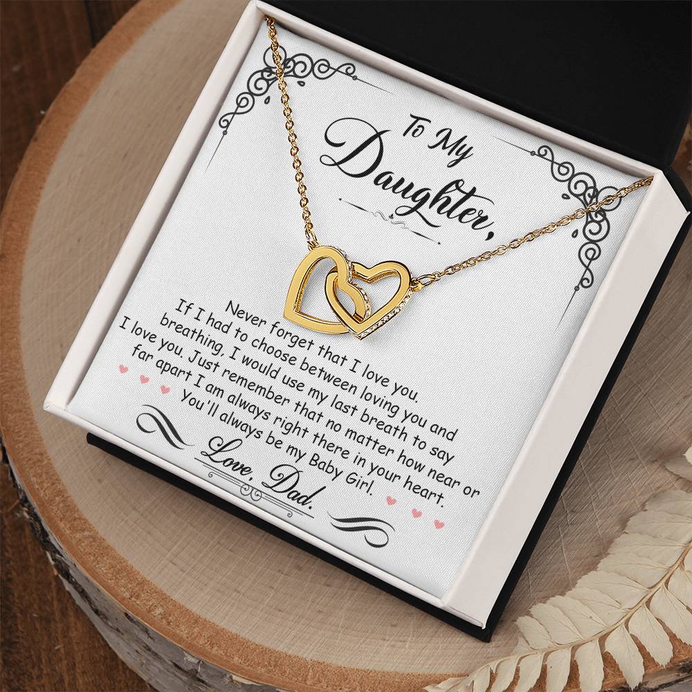 Two heart pendants embellished with CZ crystals High quality polished surgical steel and rose gold finish or 18k yellow gold finish Pendant dimensions: 0.6" (1.5cm) height / 1.1" (2.8cm) width Adjustable length: 18" - 22" (45.72 cm - 55.88 cm) Lobster clasp