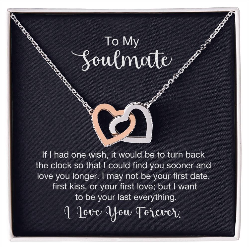 Gift card with two heart pendants embellished with CZ crystals, featuring high quality polished surgical steel and rose gold finish, pendant dimensions 0.6 inches in height and 1.1 inches in width, adjustable chain length of 18 to 22 inches.