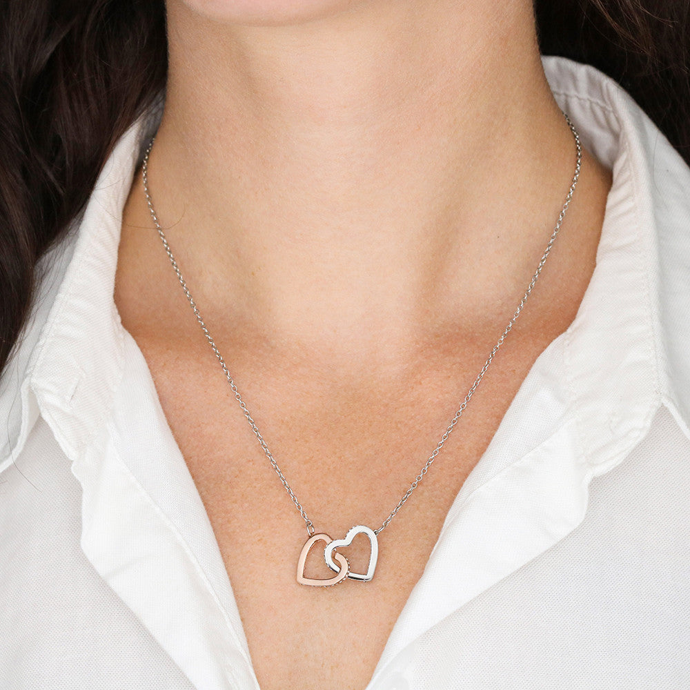 Two heart pendants embellished with CZ crystals High quality polished surgical steel and rose gold finish or 18k yellow gold finish Pendant dimensions: 0.6" (1.5cm) height / 1.1" (2.8cm) width Adjustable length: 18" - 22" (45.72 cm - 55.88 cm) Lobster clasp