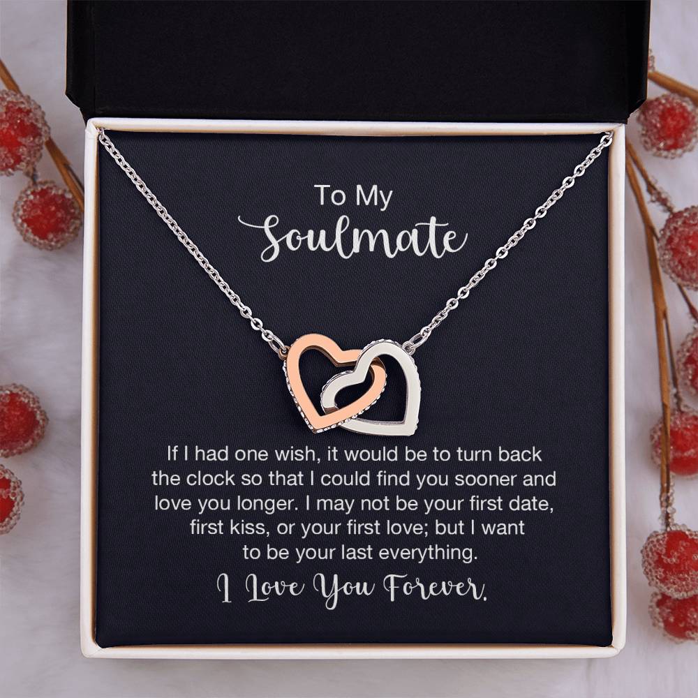 Gift card with two heart pendants embellished with CZ crystals, featuring high quality polished surgical steel and rose gold finish, pendant dimensions 0.6 inches in height and 1.1 inches in width, adjustable chain length of 18 to 22 inches.