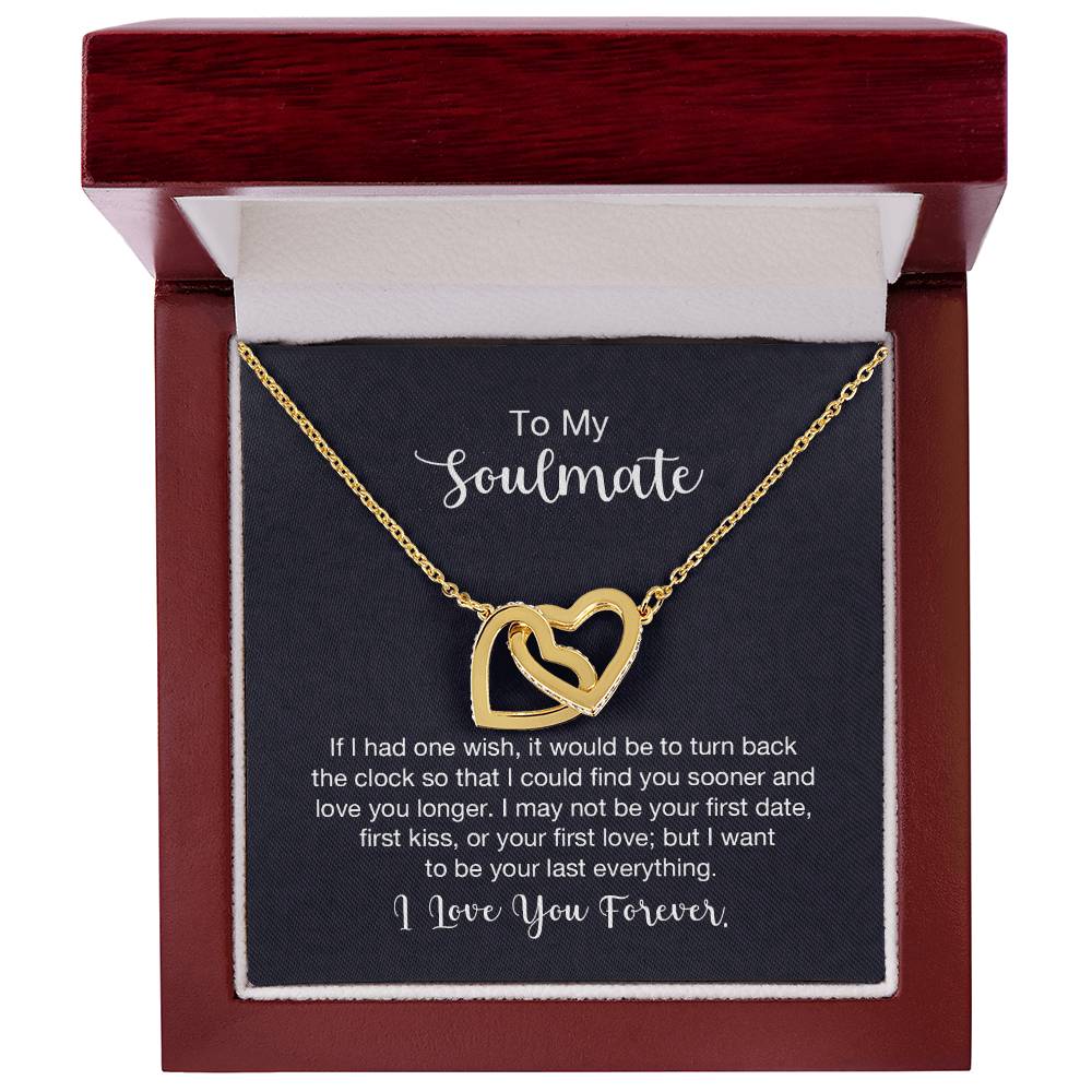 Gift card displaying a necklace with two heart pendants adorned with CZ crystals, featuring an 18k yellow gold finish over high quality polished surgical steel, pendant dimensions 0.6 inches in height and 1.1 inches in width, adjustable chain length from 18 to 22 inches.