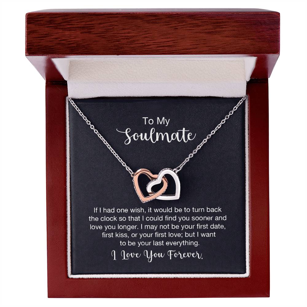 Gift card with two heart pendants embellished with CZ crystals, featuring high quality polished surgical steel and rose gold finish, pendant dimensions 0.6 inches in height and 1.1 inches in width, adjustable chain length of 18 to 22 inches.