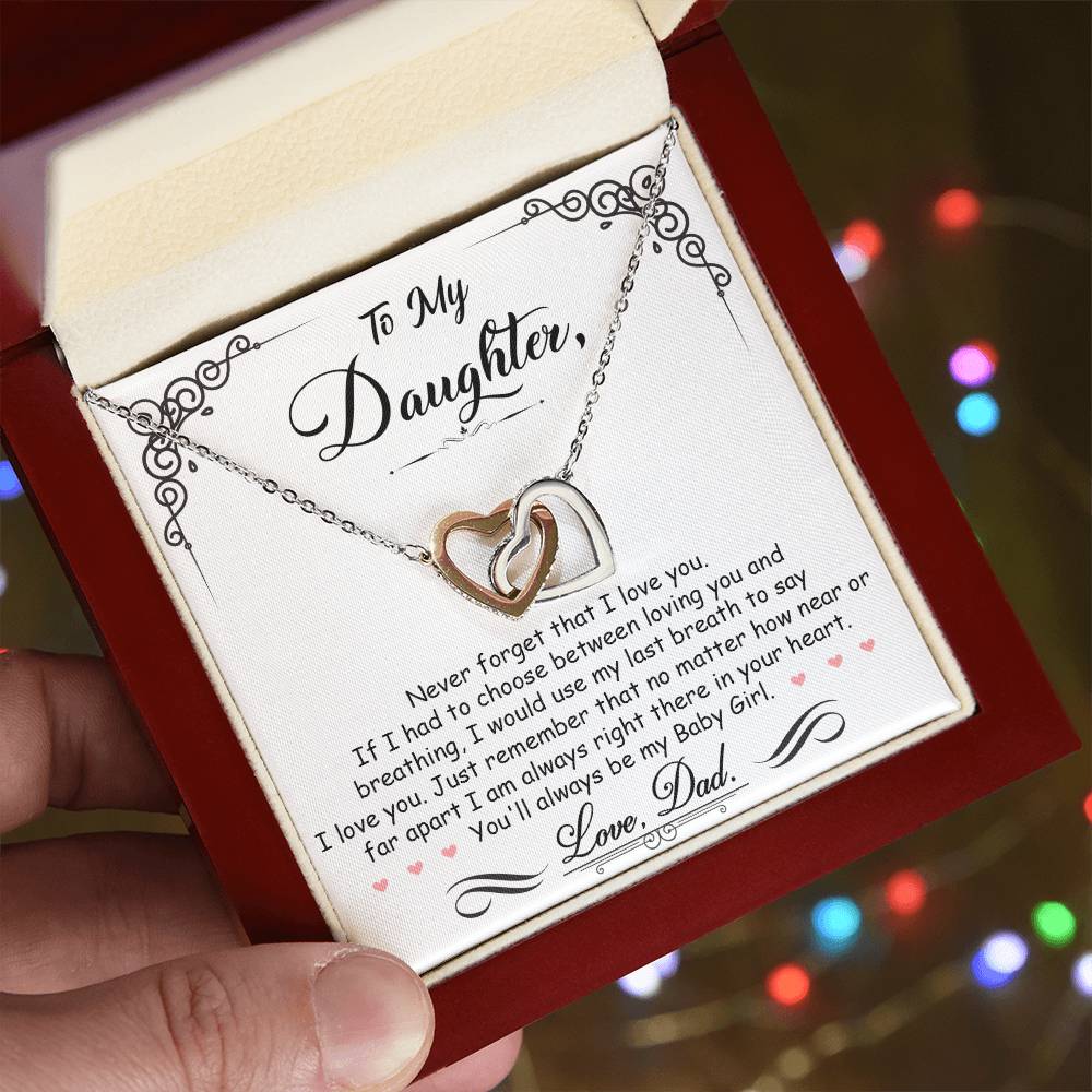 Two heart pendants embellished with CZ crystals High quality polished surgical steel and rose gold finish or 18k yellow gold finish Pendant dimensions: 0.6" (1.5cm) height / 1.1" (2.8cm) width Adjustable length: 18" - 22" (45.72 cm - 55.88 cm) Lobster clasp
