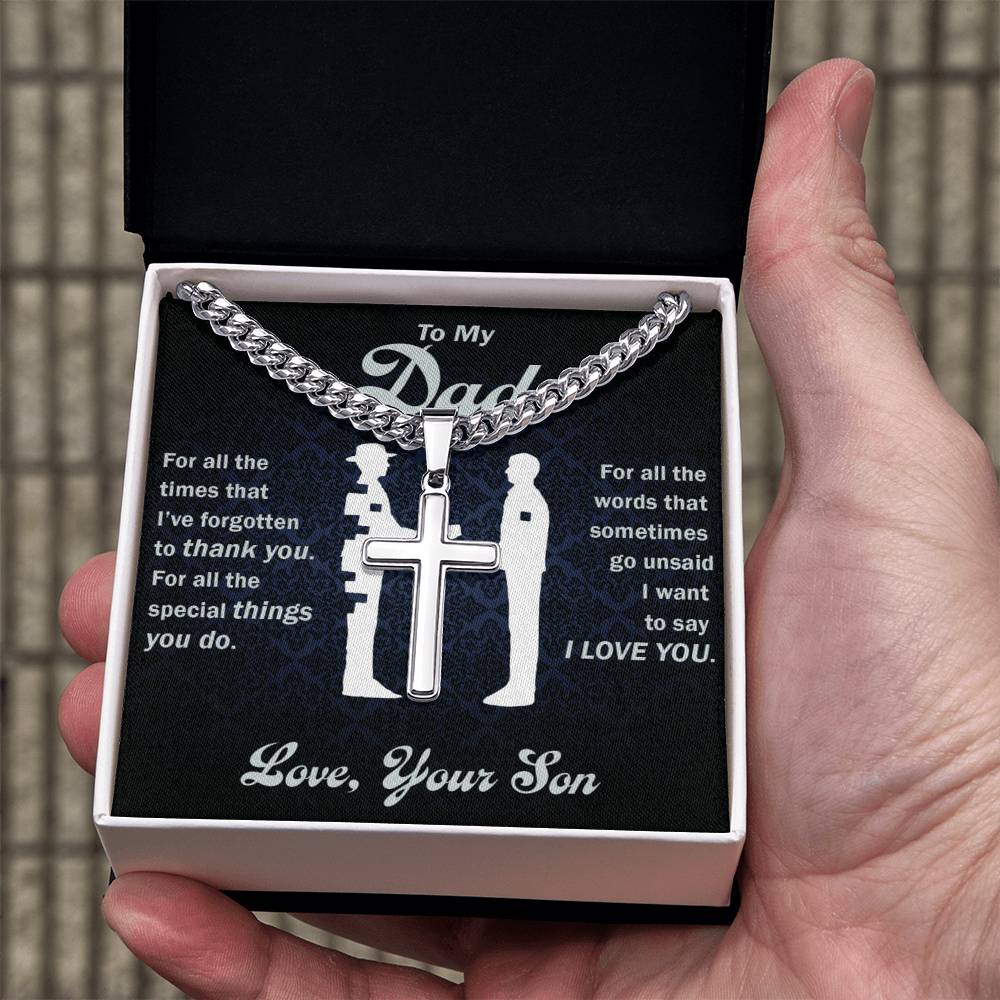 Gift box containing a Cuban link chain and a Cross pendant, perfect for a father.