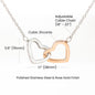 Necklace featuring two heart pendants adorned with CZ crystals, available in polished surgical steel with a rose gold or 18k yellow gold finish, adjustable from 18 to 22 inches.