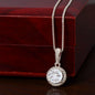 Gift box with Eternal Hope Necklace features a center cushion cut cubic zirconia that will sparkle with every step. The center crystal is adorned with equally brilliant CZ crystals, ensuring a stunning look