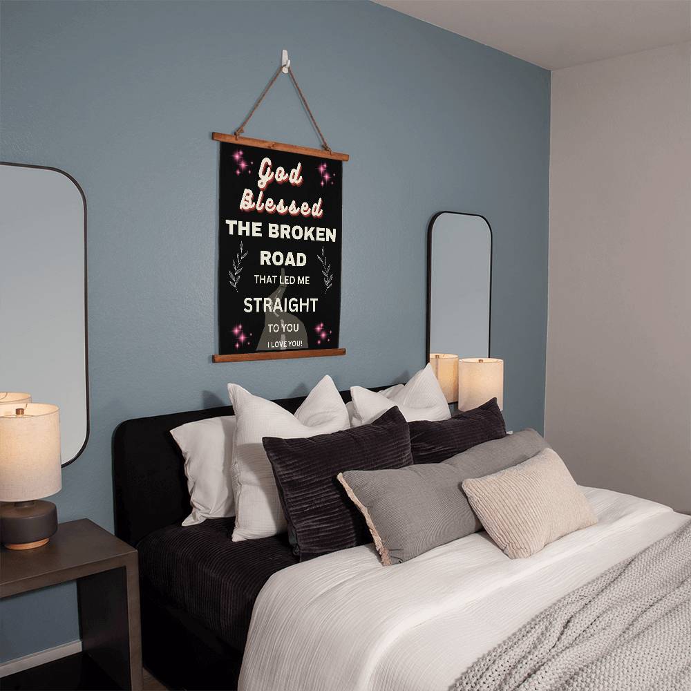 Hanging wall canvas with quote onit God blessed teh broken road that led me straight to you