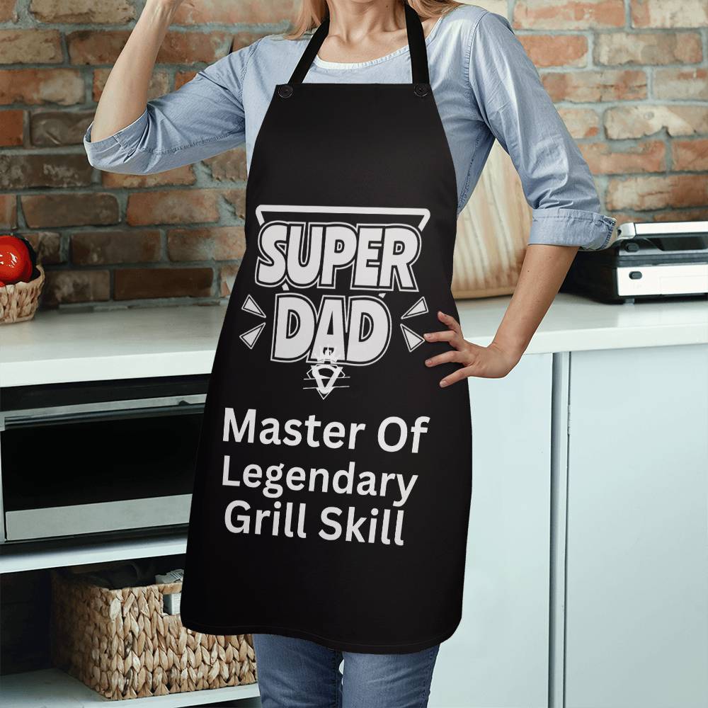 Cooking apron with the words 'Super Dad, Master of Legendary Grill Skill' printed on the front.