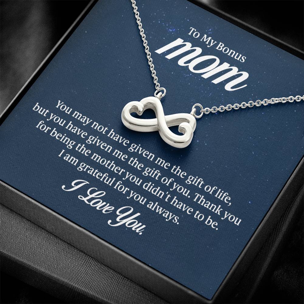 Gift card with the Endless Love Necklace, featuring a heart-shaped infinity symbol crafted in 14k white gold finish, hand-polished for a magnificent shine