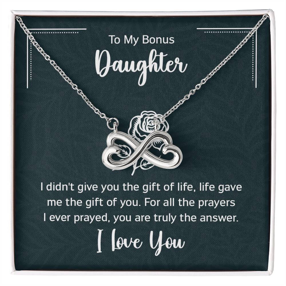Gift box with a heart pendant necklace on It. 14k white gold finish or 18k yellow gold finish  6.5mm round cut cubic zirconia stone  Pendant dimensions: 0.8" (2.2cm) height / 0.7" (1.8cm) width  Adjustable chain length: 18" - 22" (45.72cm - 55.88cm)  Lobster clasp attachment