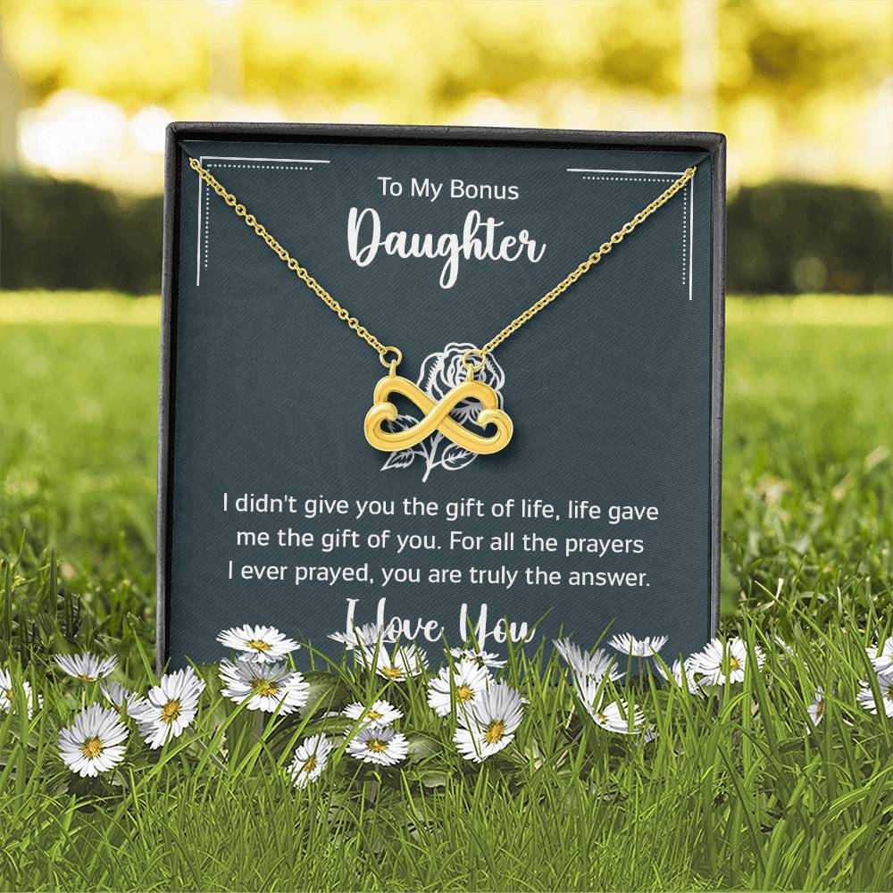 Gift box with a heart pendant necklace on It. 14k white gold finish or 18k yellow gold finish 6.5mm round cut cubic zirconia stone Pendant dimensions: 0.8" (2.2cm) height / 0.7" (1.8cm) width Adjustable chain length: 18" - 22" (45.72cm - 55.88cm) Lobster clasp attachment
