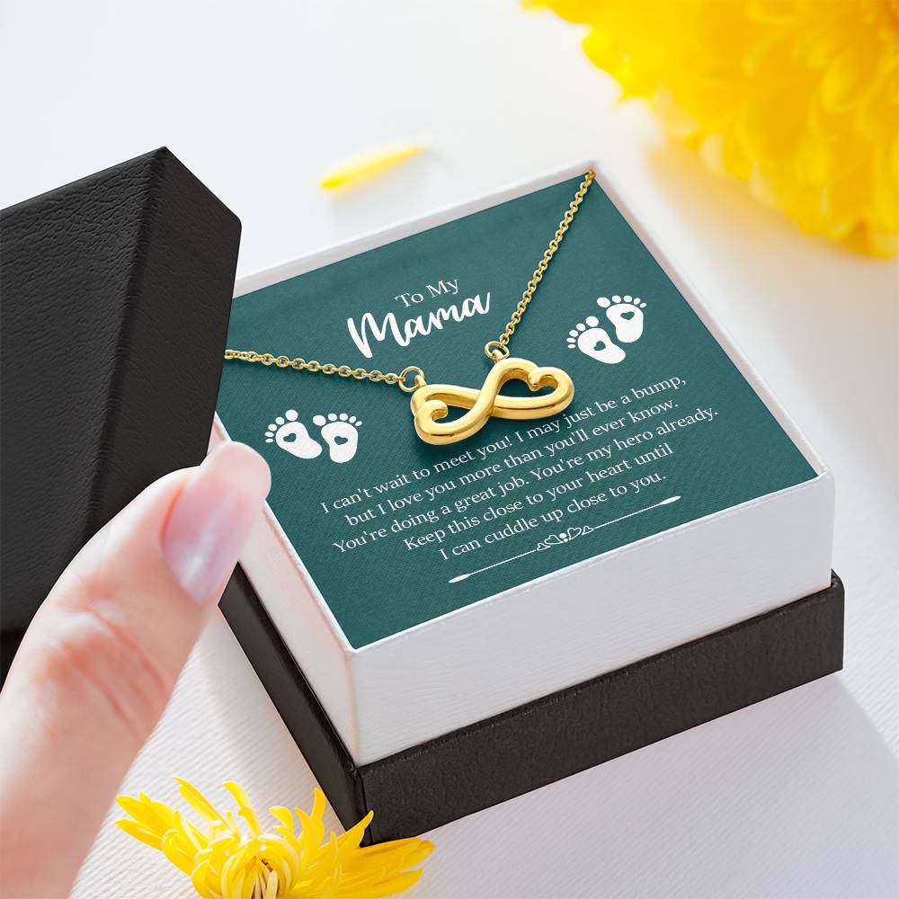 Endless Love Necklace on a gift card, showcasing a heart-shaped infinity symbol in 18k yellow gold finish, artisan-crafted and hand-polished, dimensions 0.5 inches in height and 1 inch in width, hanging elegantly on a 16 to 22-inch adjustable cable chain with a lobster clasp, and inscribed with 'I'll love you till the end of time.