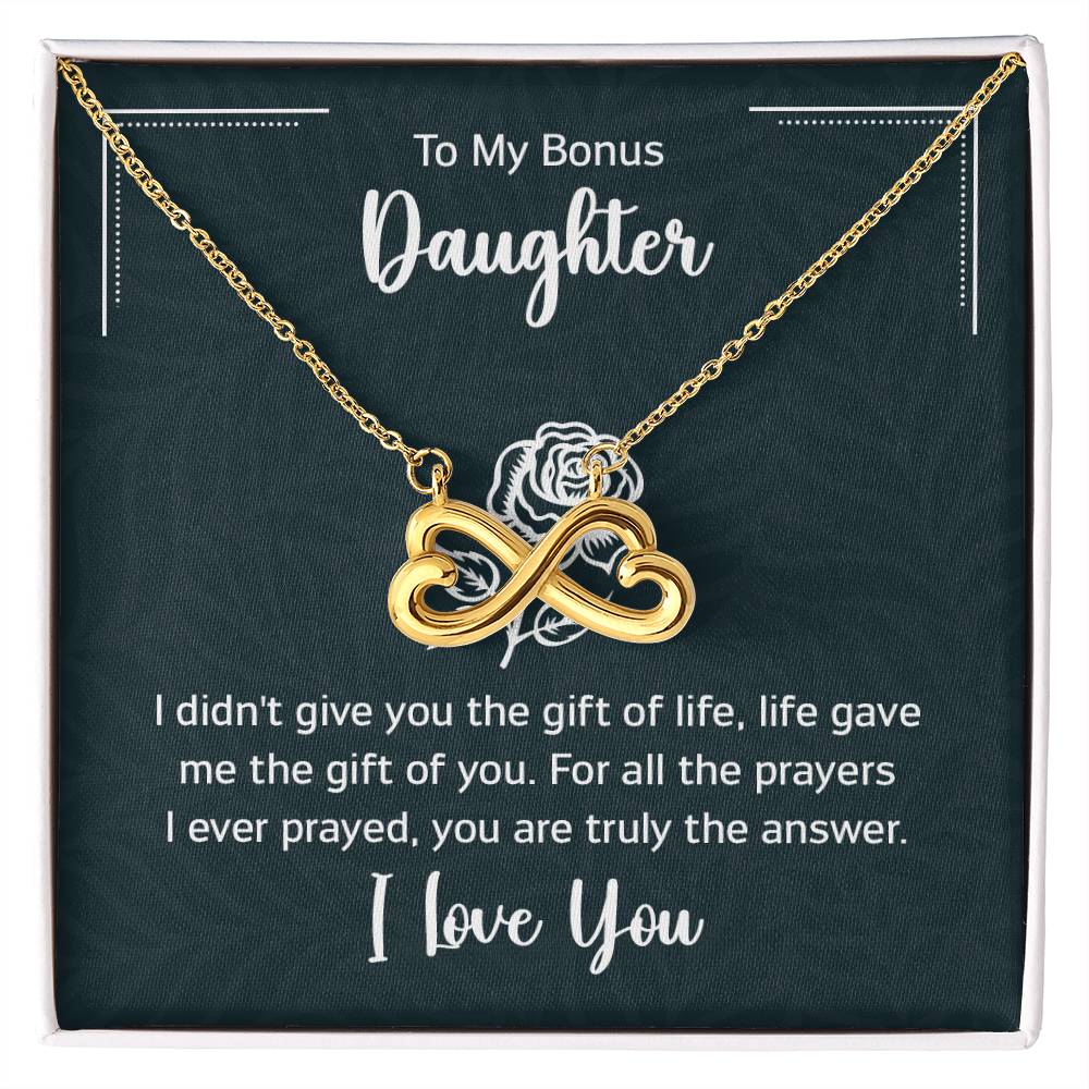Gift box with a heart pendant necklace on It. 14k white gold finish or 18k yellow gold finish 6.5mm round cut cubic zirconia stone Pendant dimensions: 0.8" (2.2cm) height / 0.7" (1.8cm) width Adjustable chain length: 18" - 22" (45.72cm - 55.88cm) Lobster clasp attachment