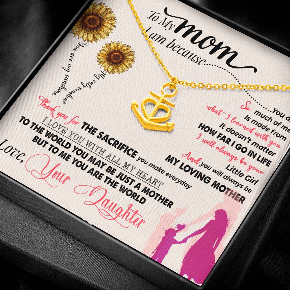gift card with a combination heart and ship anchor pendant necklace Material is gold finish over stainless steel