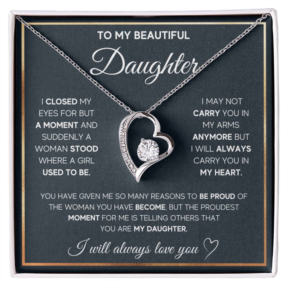 The dazzling Forever Love Necklace is sure to make her heart melt! This necklace features a stunning 6.5mm CZ crystal surrounded by a polished heart pendant embellished with smaller crystals to add extra sparkle and shine. Beautifully crafted with either a white gold or yellow gold finish, be sure to give her a classic gift she can enjoy everyday.