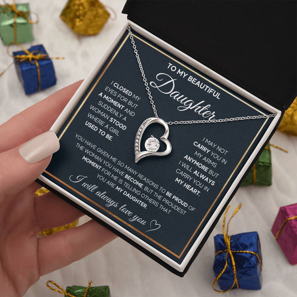 The dazzling Forever Love Necklace is sure to make her heart melt! This necklace features a stunning 6.5mm CZ crystal surrounded by a polished heart pendant embellished with smaller crystals to add extra sparkle and shine. Beautifully crafted with either a white gold or yellow gold finish, be sure to give her a classic gift she can enjoy everyday.