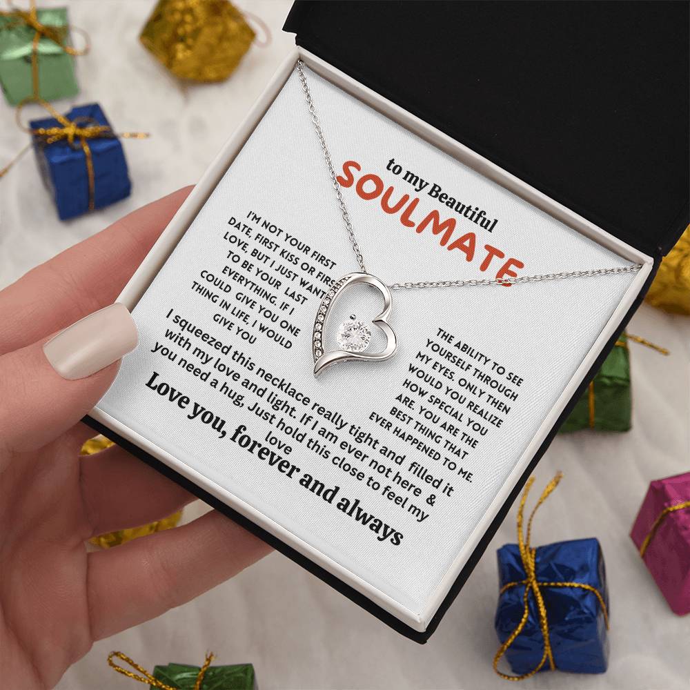 Gift card with a necklace featuring a 6.5mm round cut cubic zirconia stone in 14k white gold finish, pendant dimensions 0.8 inches in height and 0.7 inches in width, adjustable chain length of 18 to 22 inches, with a lobster clasp.