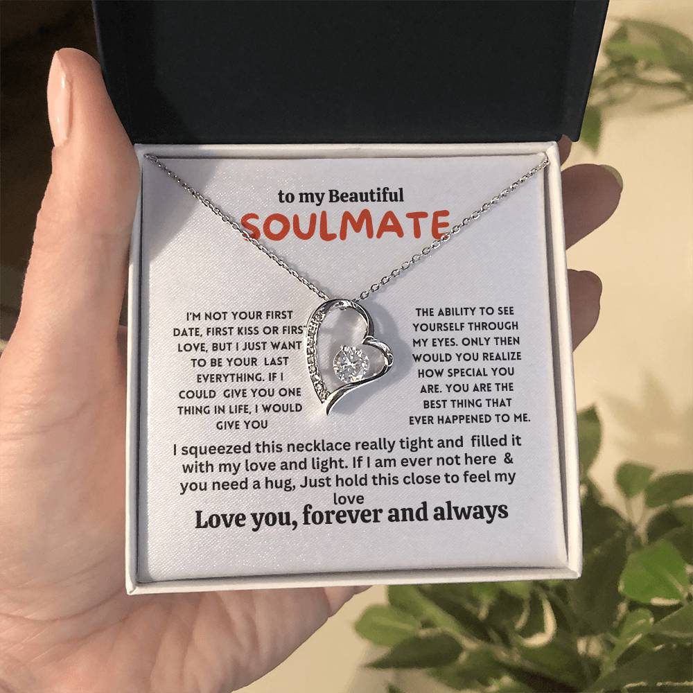 Gift card with a necklace featuring a 6.5mm round cut cubic zirconia stone in 14k white gold finish, pendant dimensions 0.8 inches in height and 0.7 inches in width, adjustable chain length of 18 to 22 inches, with a lobster clasp.