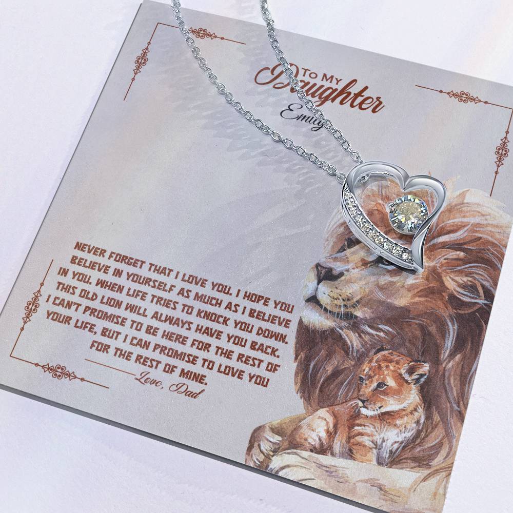 a gift box with a stainless steel heart shapped pedant necklace with a large cz diamond and small ca chip diamonds on the perimeter A