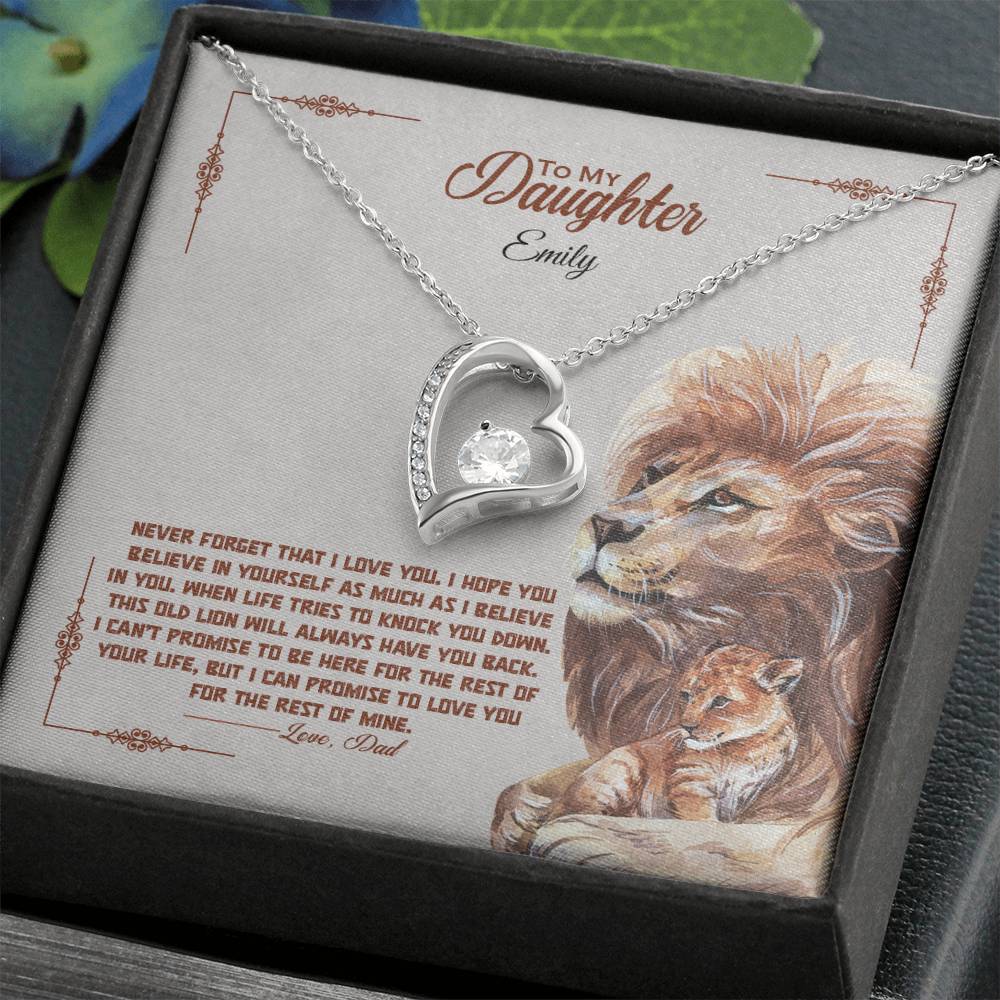 a gift box with a stainless steel heart shapped pedant necklace with a large cz diamond and small ca chip diamonds on the perimeter A