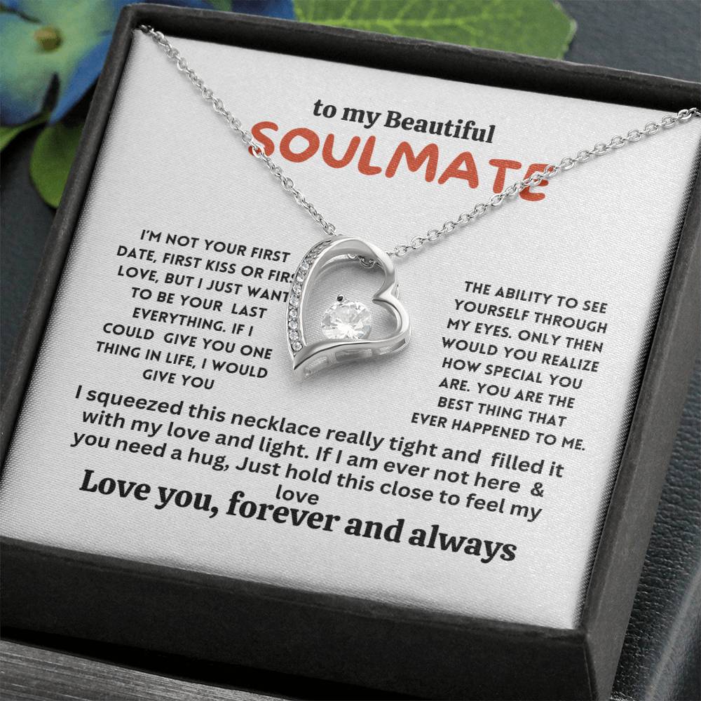 Gift card with a necklace featuring a 6.5mm round cut cubic zirconia stone in 14k white gold finish, pendant dimensions 0.8 inches in height and 0.7 inches in width, adjustable chain length of 18 to 22 inches, with a lobster clasp.