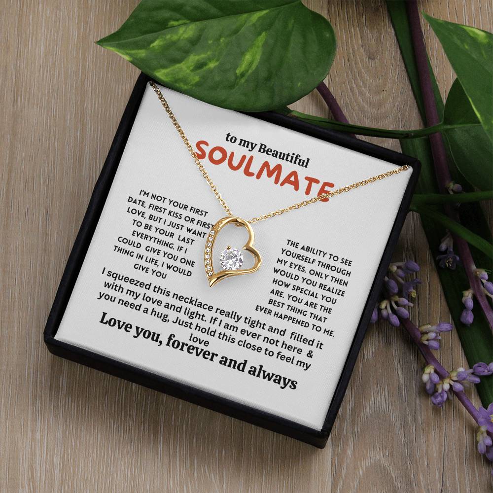 Necklace on a gift card, showcasing a 6.5mm round cut cubic zirconia stone in 18k yellow gold finish, with pendant dimensions of 0.8 inches in height and 0.7 inches in width, adjustable chain length from 18 to 22 inches, and a lobster clasp.